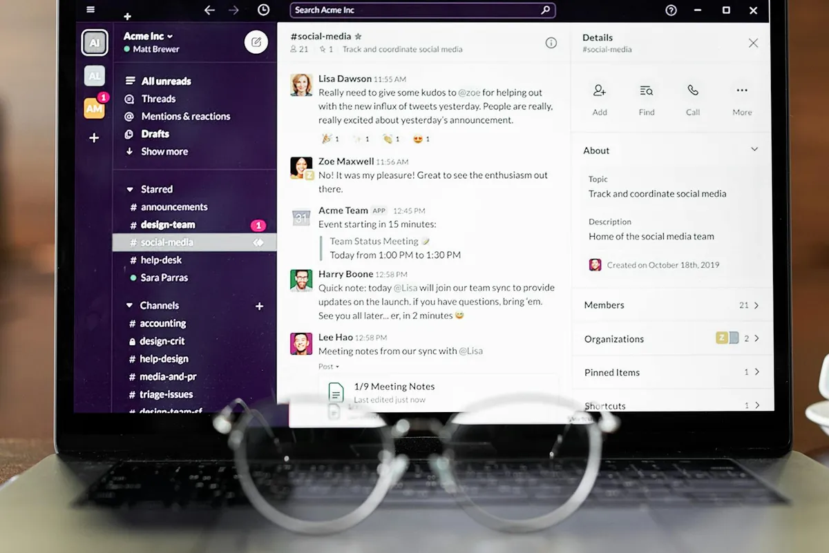 laptop showing team collaboration chat app